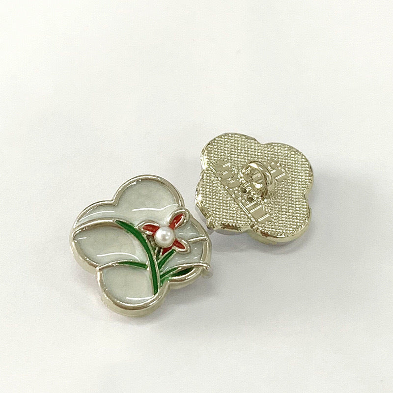 15mm vintage metal button with orchid blossom, pearl center, gold-tone back