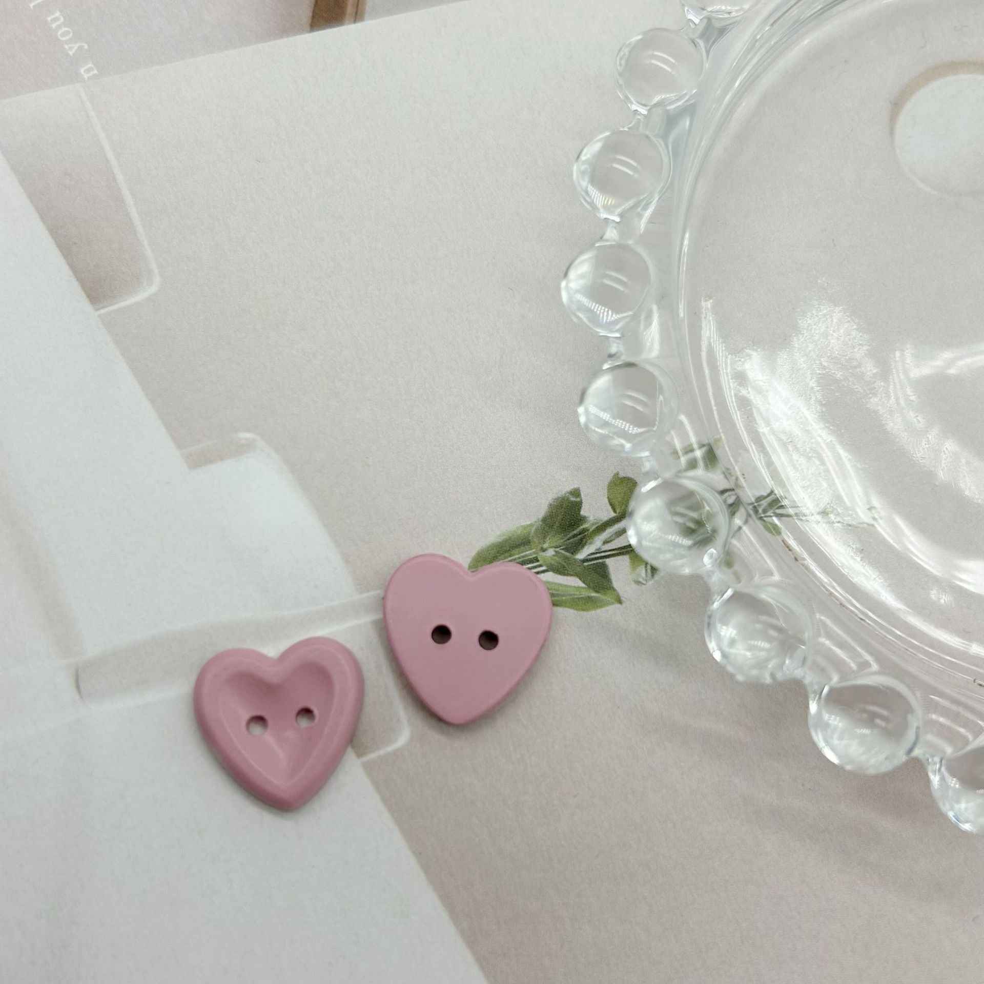 Mauve/pastel pink heart buttons with two holes, two-piece set