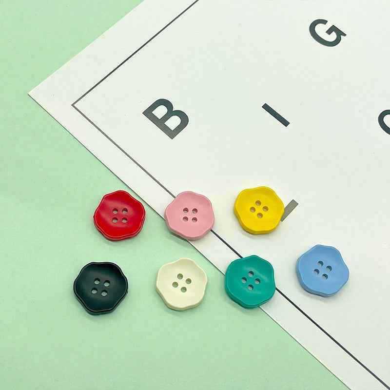 Assorted flower-shaped 4-hole plastic buttons set, kids clothing colors red, pink, yellow, blue