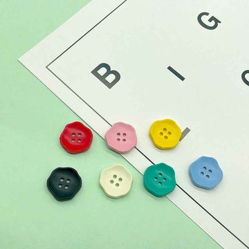 Assorted flower-shaped 4-hole plastic buttons set, kids clothing colors red, pink, yellow, blue