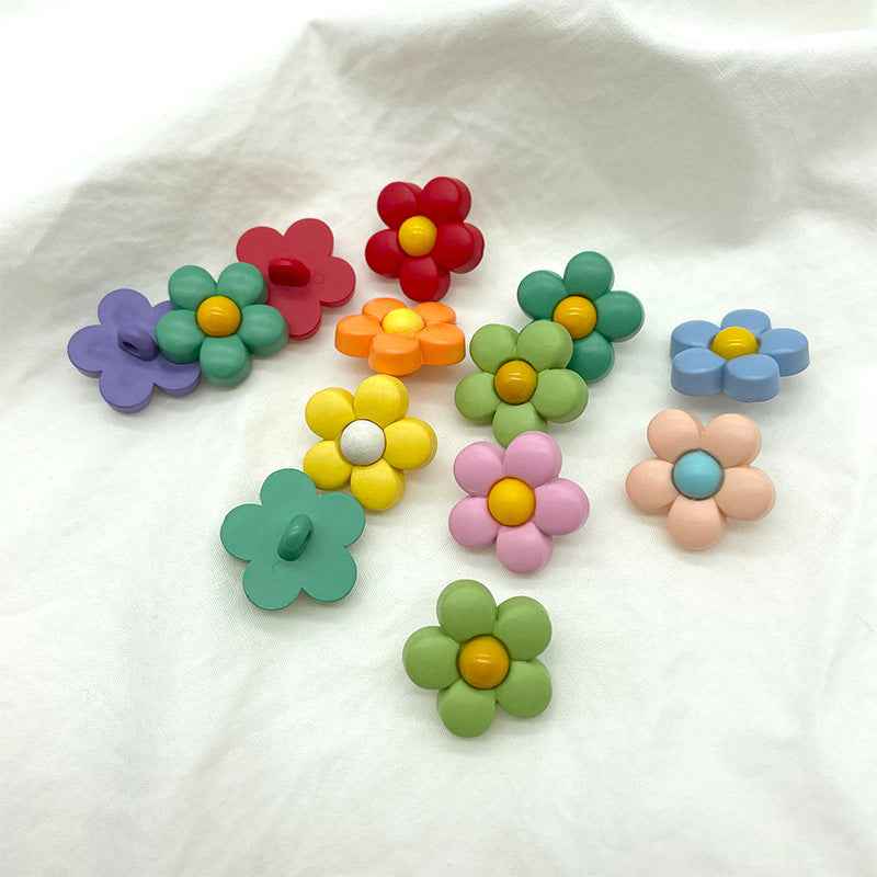 Small flower shank plastic buttons in red, green, purple, yellow, pink, blue, orange