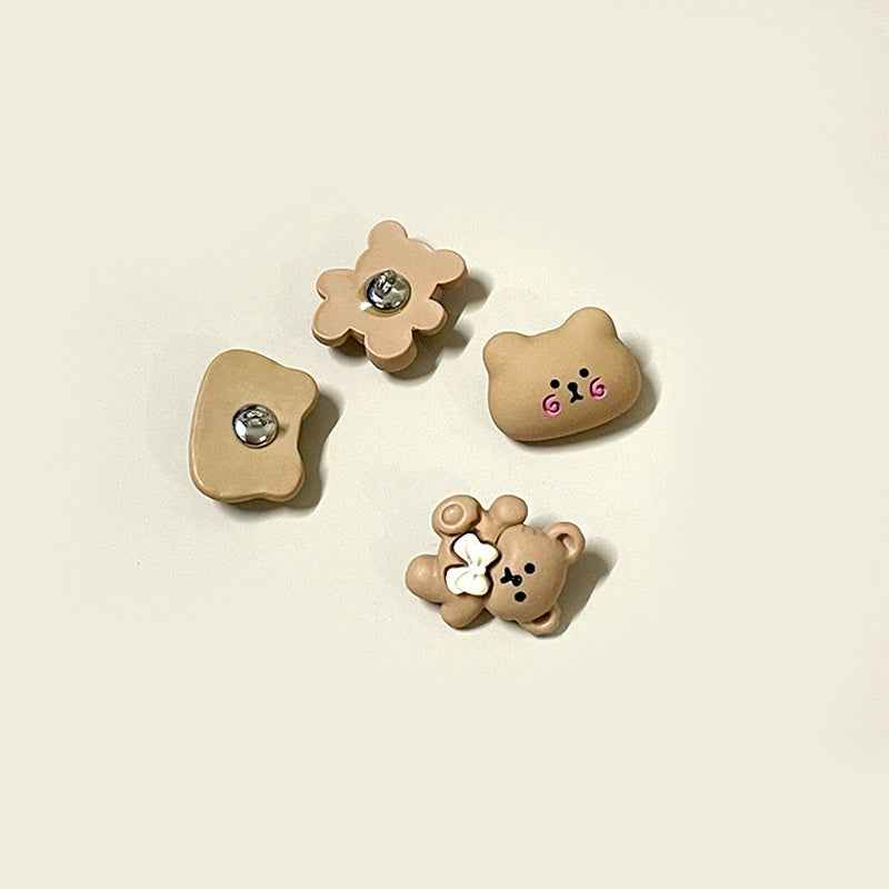 Cartoon bear resin buttons with metal centers; flower, bow, and face designs