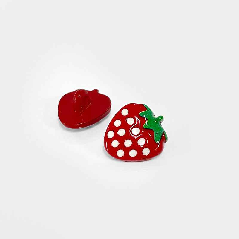 Pair of red strawberry cartoon plastic buttons; one plain back view