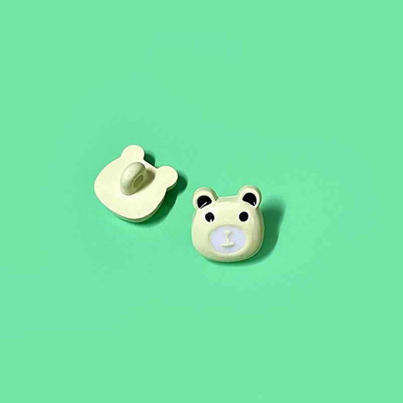 White bear head plastic shank button with visible loop, kids