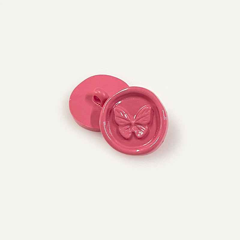 Hot pink round plastic shank buttons with butterfly embossed front