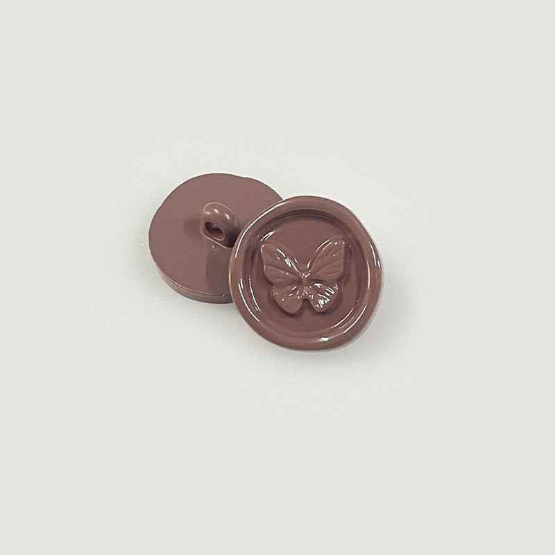 Brown round plastic shank buttons with butterfly embossed front