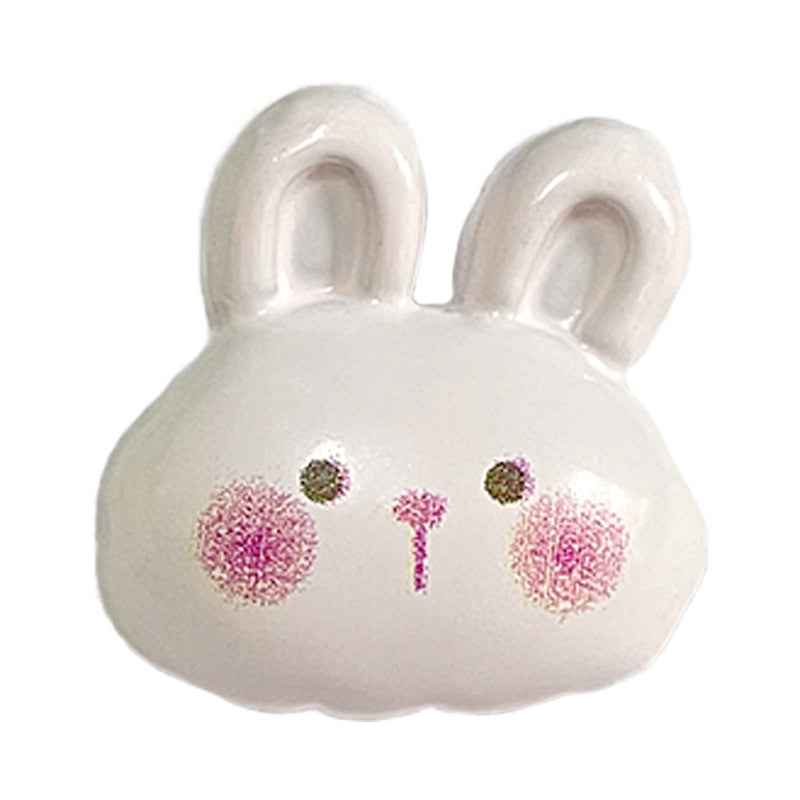 White cartoon bunny button with pink whisker spots and two raised ears, 2-hole style