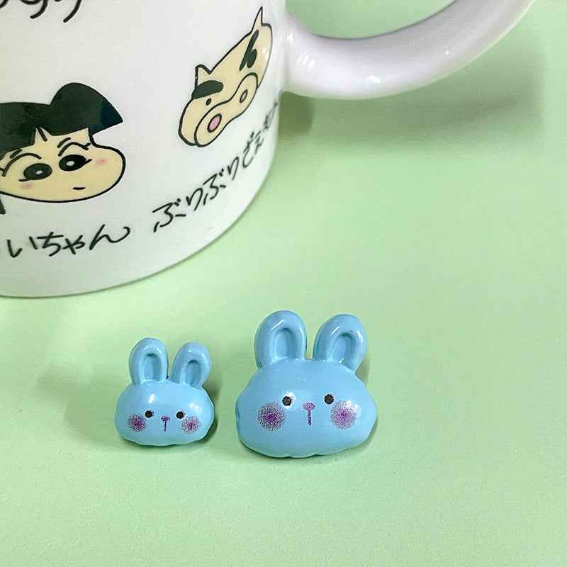 Blue cartoon bunny plastic buttons with pink cheek spots and 2-hole fastening back