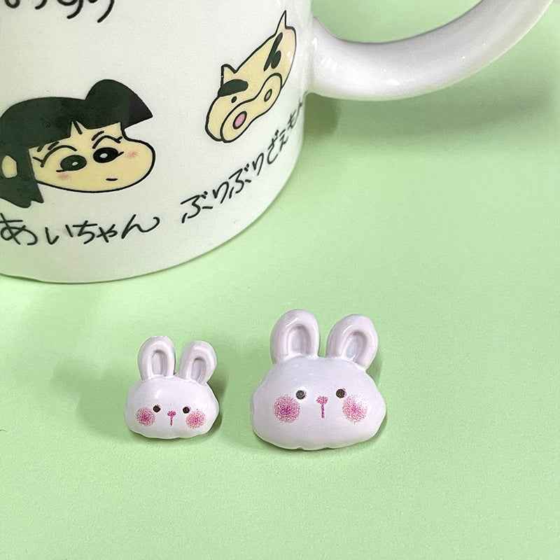 Lavender cartoon bunny plastic button with pink details and 2-hole fastening back