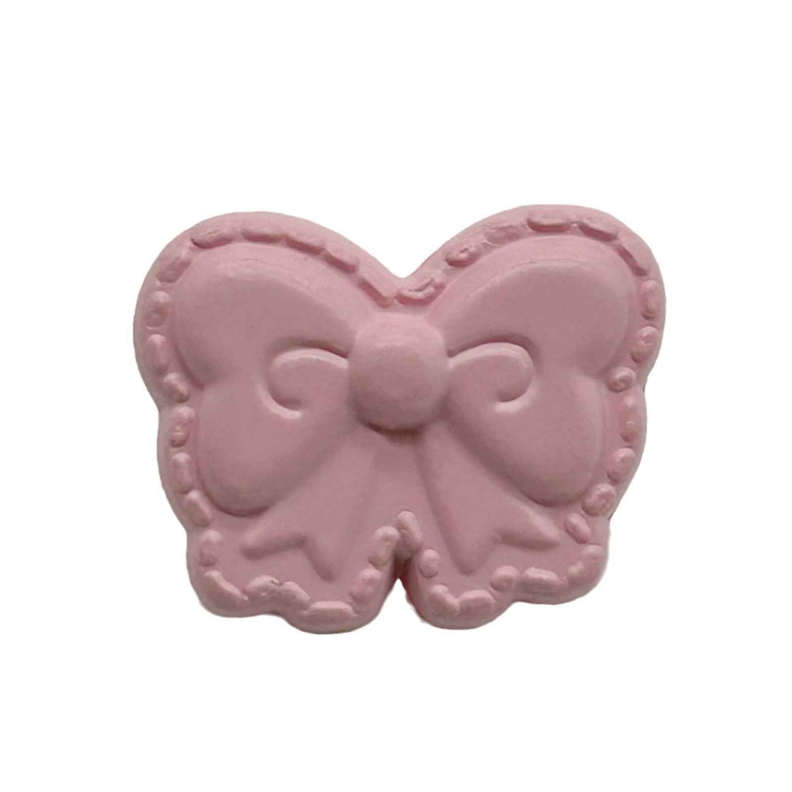 Light pink butterfly-shaped shank button with bow detail, front view