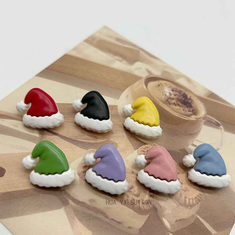 Set of colorful Christmas hat plastic buttons with white fur and red, black, yellow, green caps