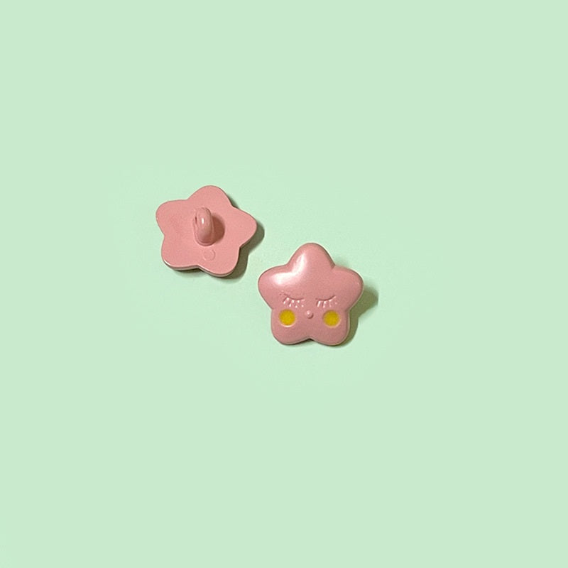 Rosa Cartoon-Sternknöpfe aus Kunststoff mit Nabe/Loch