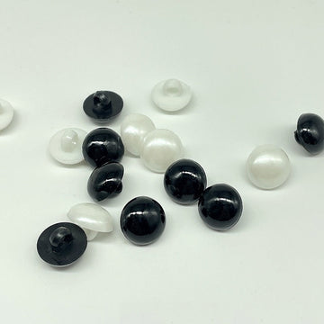 Black and white plastic mushroom buttons with sew-on shanks, 30mm