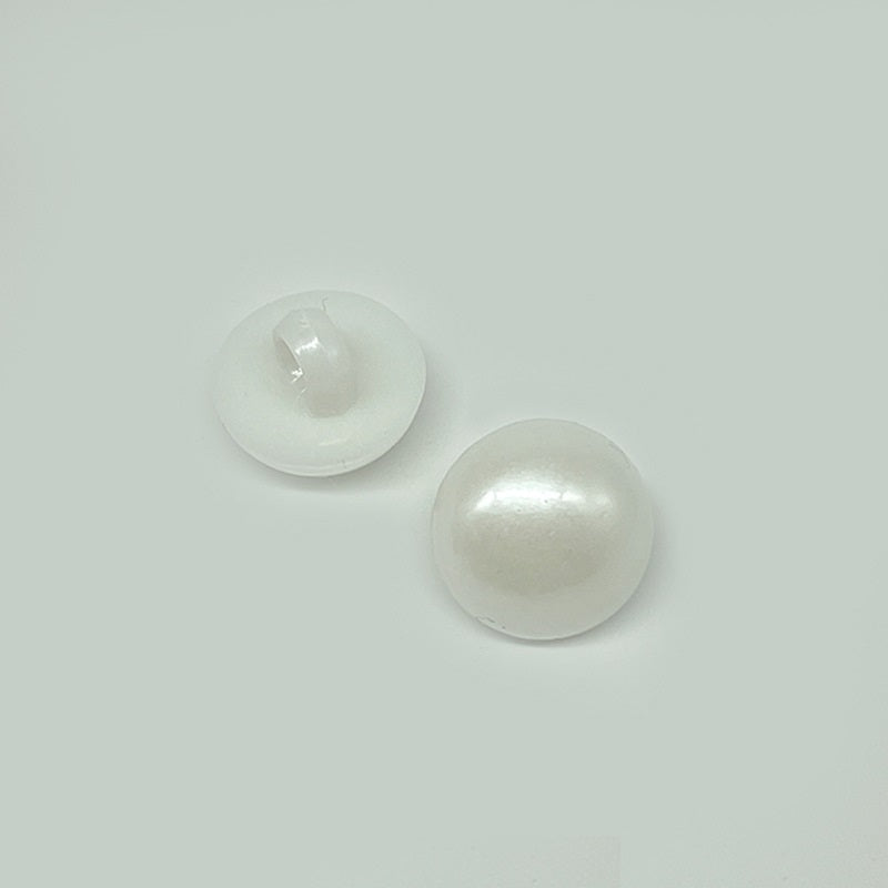 White plastic mushroom buttons with sew-on shanks, round style (2 shown)