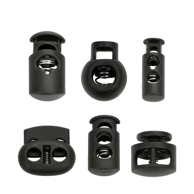Schwarze Doppelloch-Kordelstopper mit Feder, Clip-Slider-Toggles aus Kunststoff