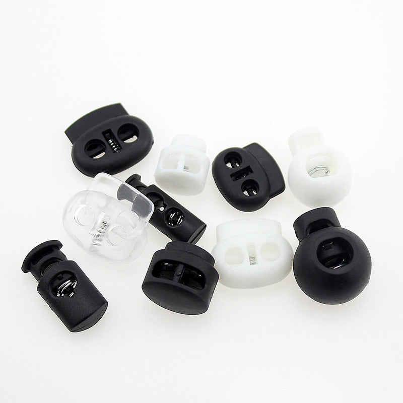Kordelstopper-Set aus Kunststoff in Schwarz und Weiß/transparent, mit Feder