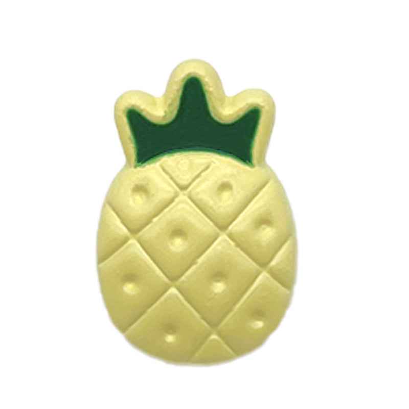 Nahaufnahme: gelber Cartoon-Ananas Kunststoffknopf mit grüner Krone und Relief