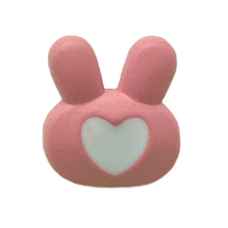 Pink bunny plastic button with a white heart cutout, 2 ear design