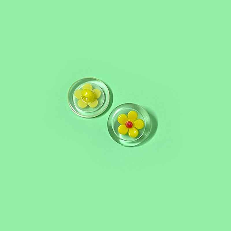 Yellow flower transparent plastic shank buttons with pink center, round two-tone (2 shown)