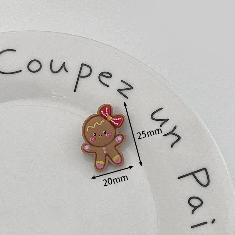 Gingerbread reindeer resin button with pink bow, brown face, metal shank; 20x25mm