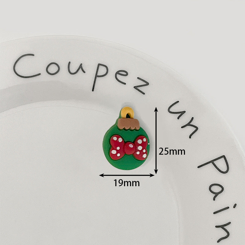 Green ornament resin button with red bow and red dots, metal shank; 19x25mm