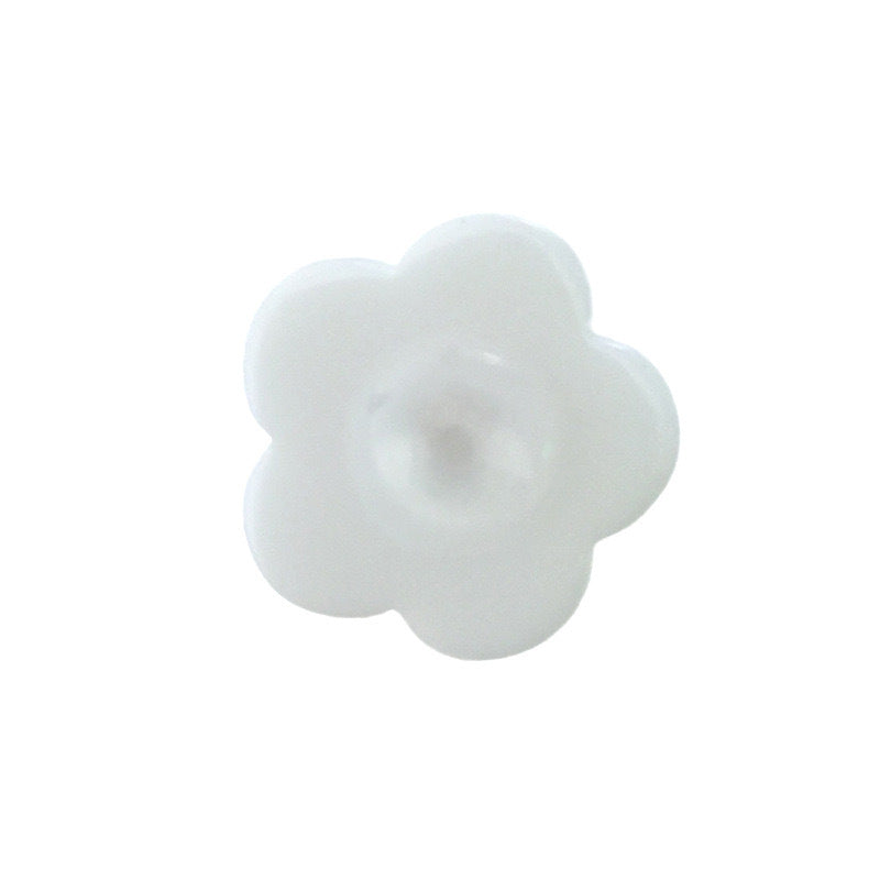 White plum blossom button with shank, close-up of floral petal design