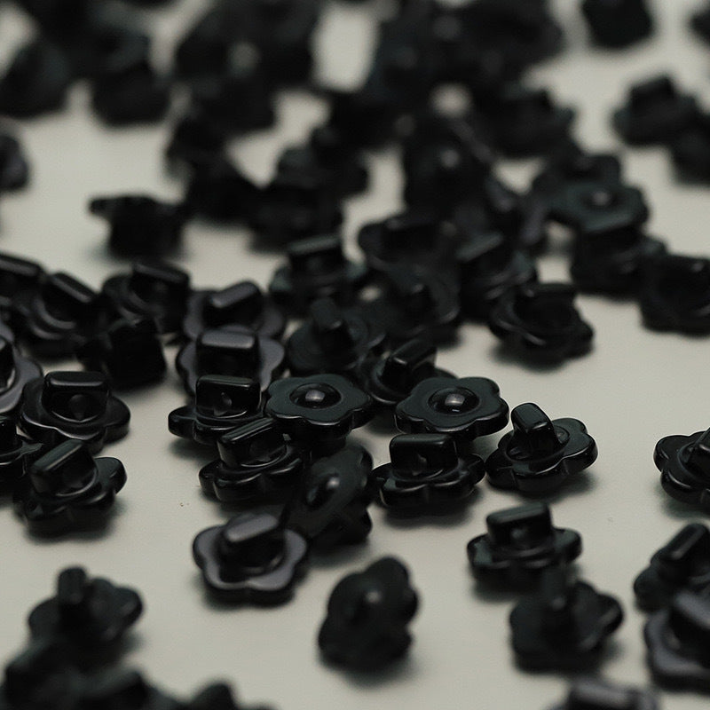 Black plum blossom buttons with shanks, round front floral pattern