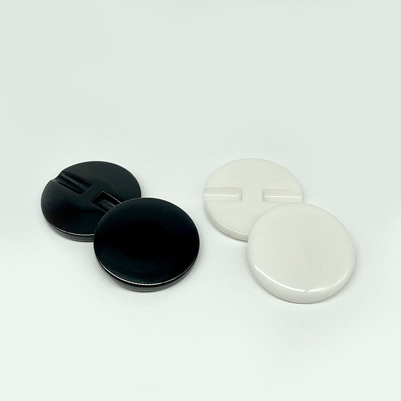 Black and white resin concealed-hole buttons, 10–34 mm, round, flat backs