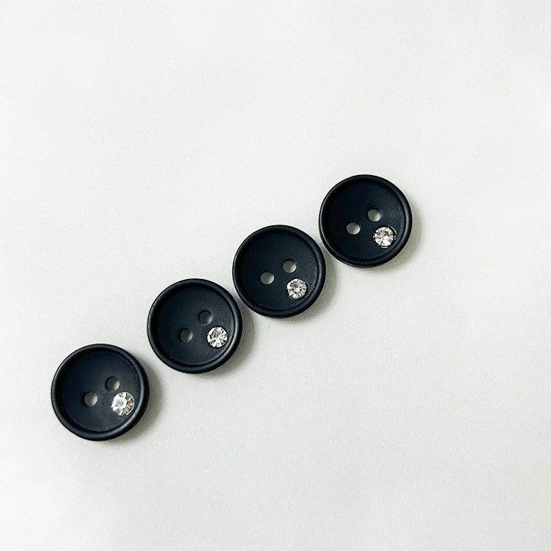 Round black resin buttons with clear rhinestone and two-hole face, 12.5/15mm