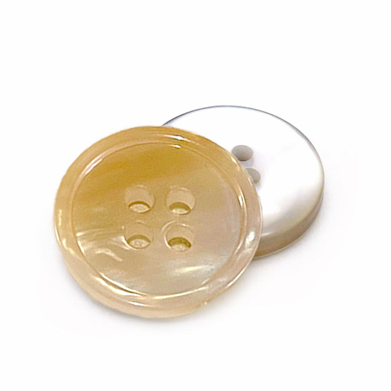 Gold round gradient resin button with four holes, glossy pearlized finish