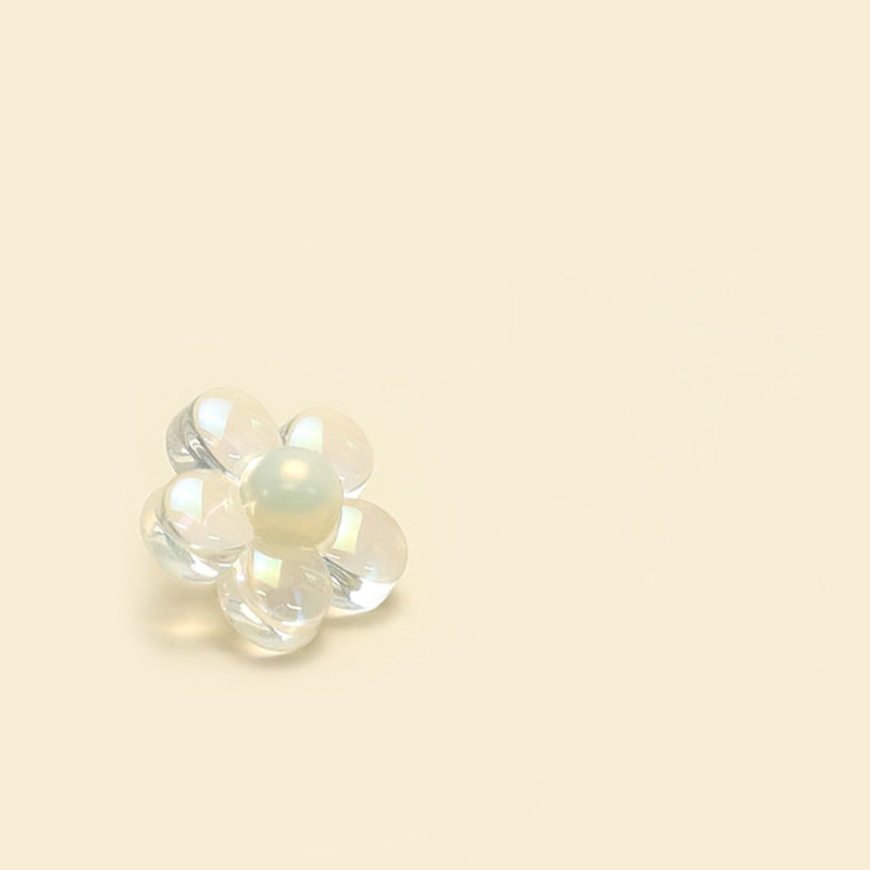 Clear resin flower button with shank, 6-petal flower, glossy iridescent center