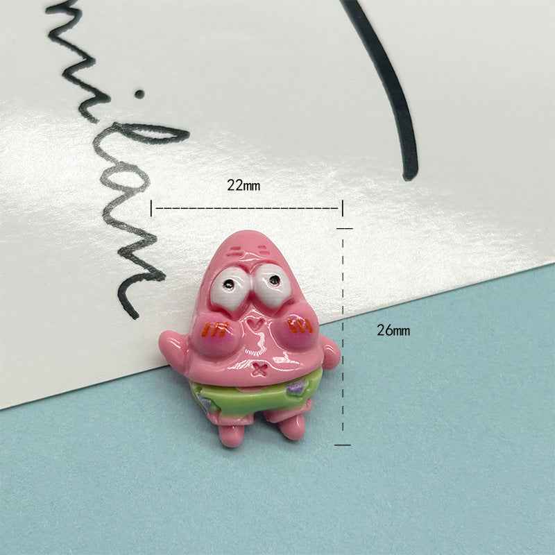 Pink Patrick resin button with metal shank, about 22mm wide and 26mm tall