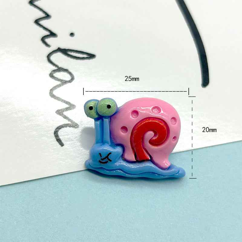 Blue and pink Gary snail resin button with metal shank, about 25mm x 20mm