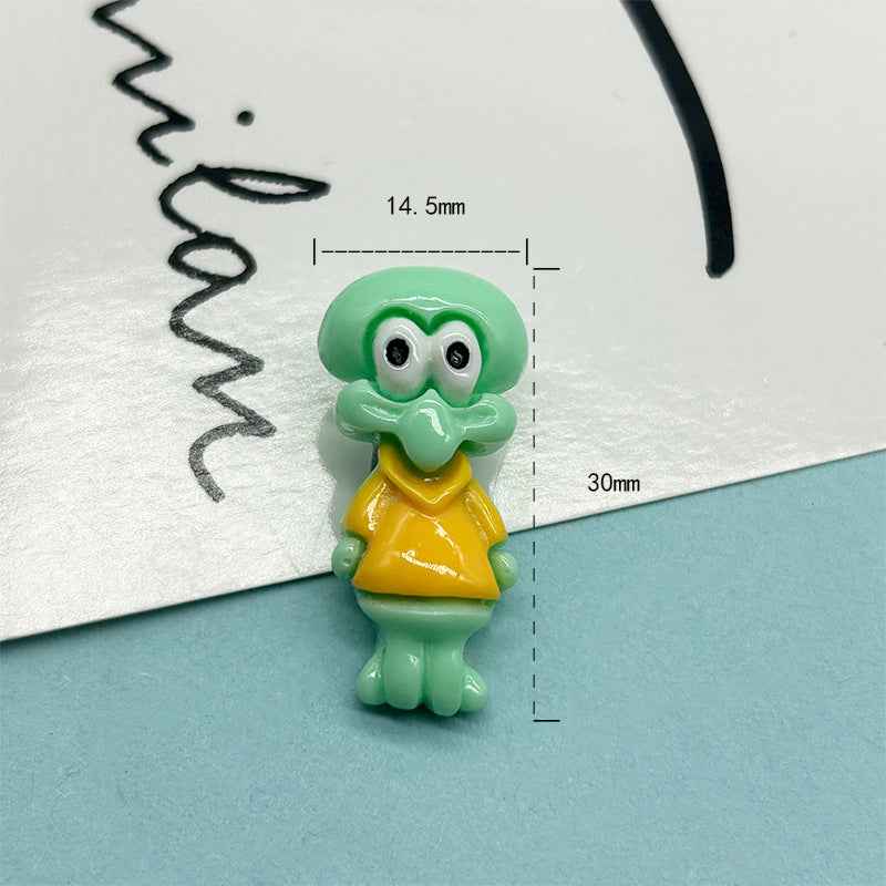 Green cartoon character resin button with metal shank, about 30mm tall