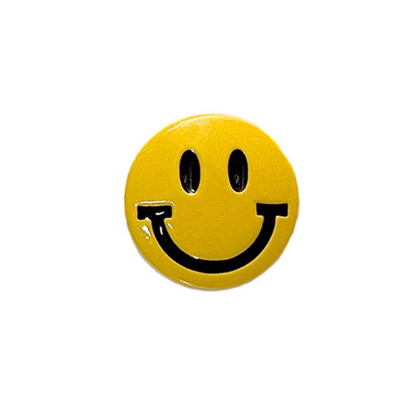 Yellow cartoon smiley face button with shank, round