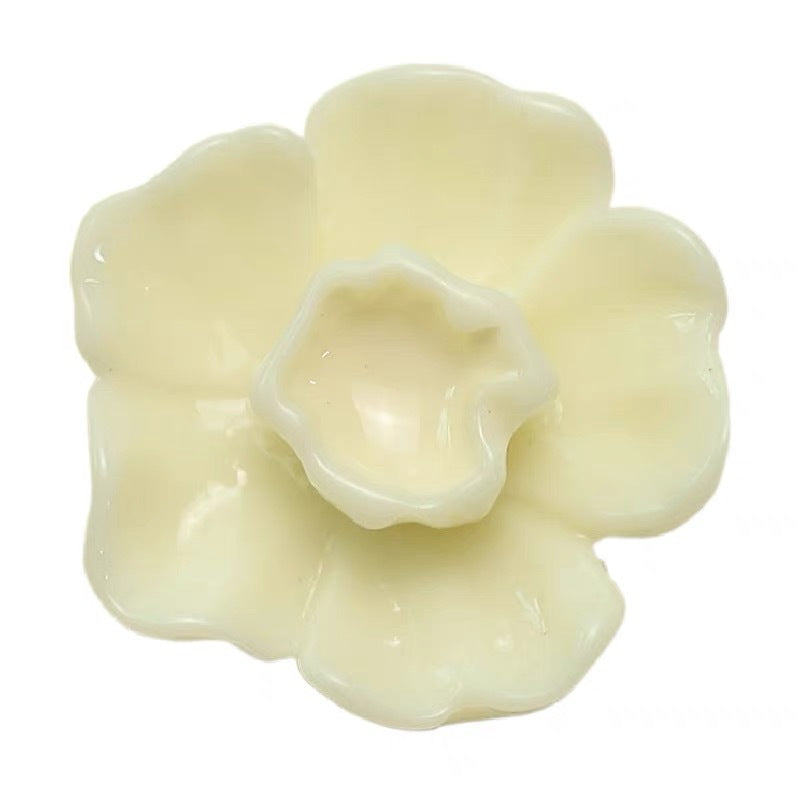 White 3D flower button with metal shank, glossy petal design