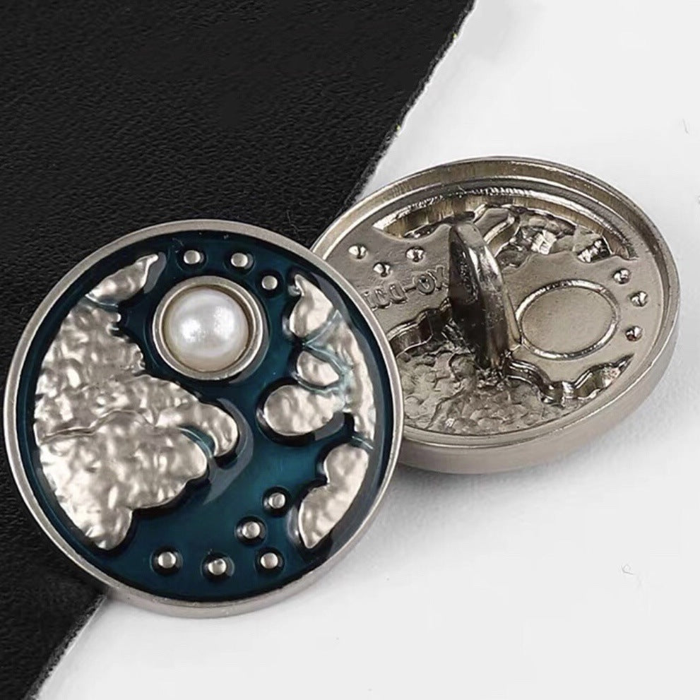Moon motif sewing button, blue enamel, pearl center, silver-tone metal, visible back, 20mm.