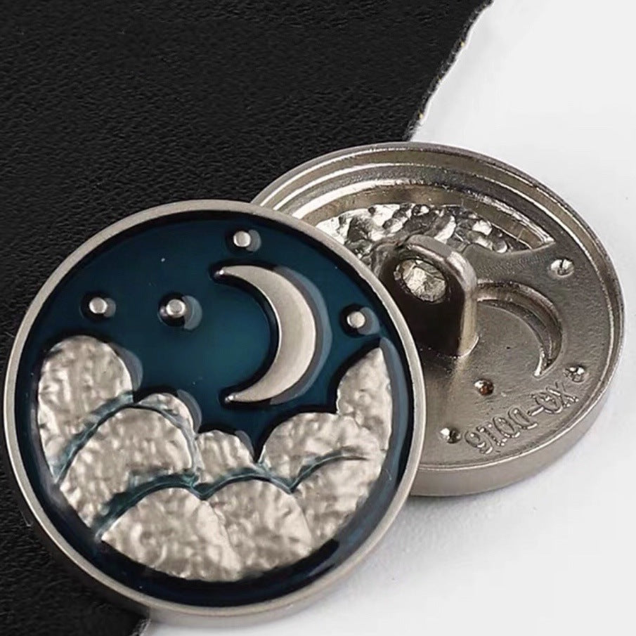 Moon motif sewing button, blue enamel crescent, pearl center, silver-tone back detail, 20mm.