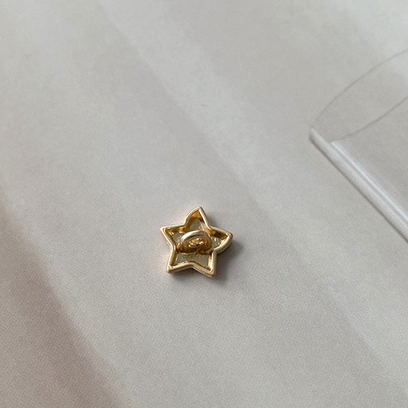 Gold star-shaped metal button stud with crescent moon center, 12mm