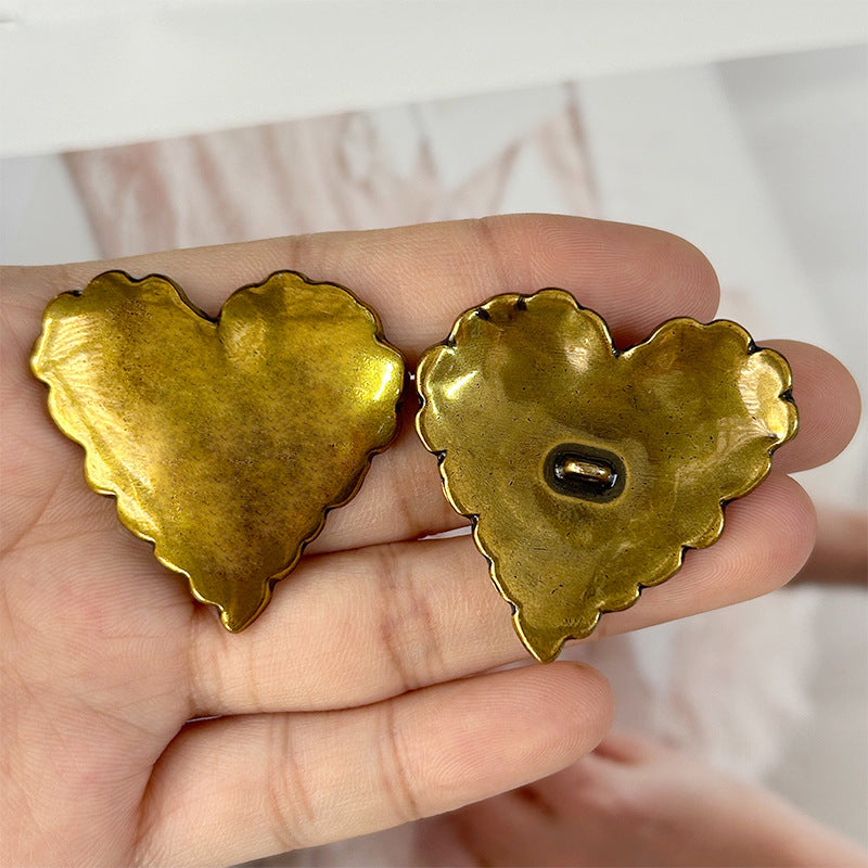 Heart-shaped metal buttons set with loop back, antique gold glossy finish