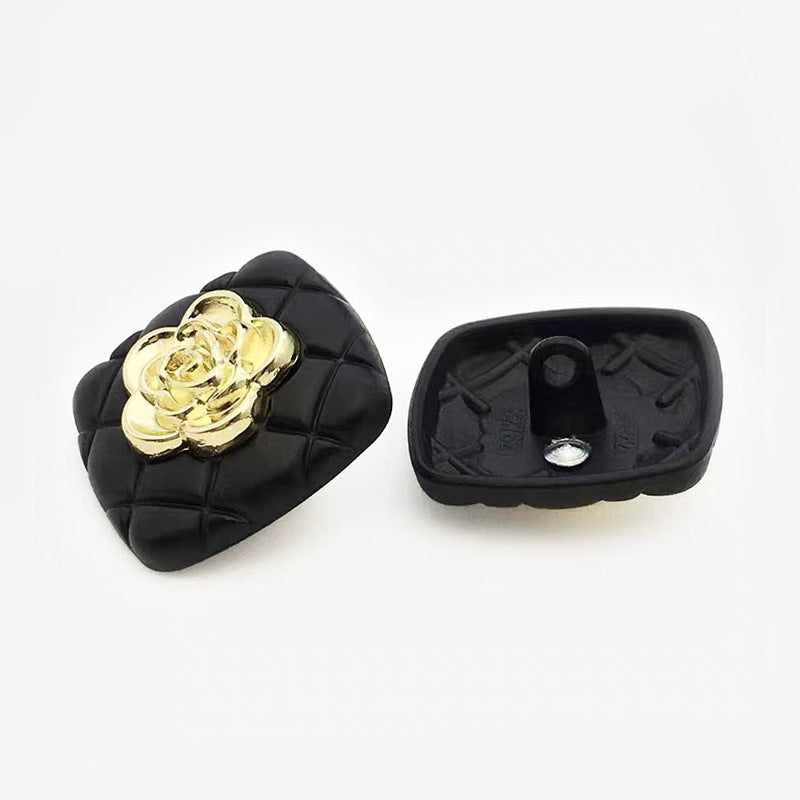 Heart bow button set: black diamond texture with gold bow top; back side shown