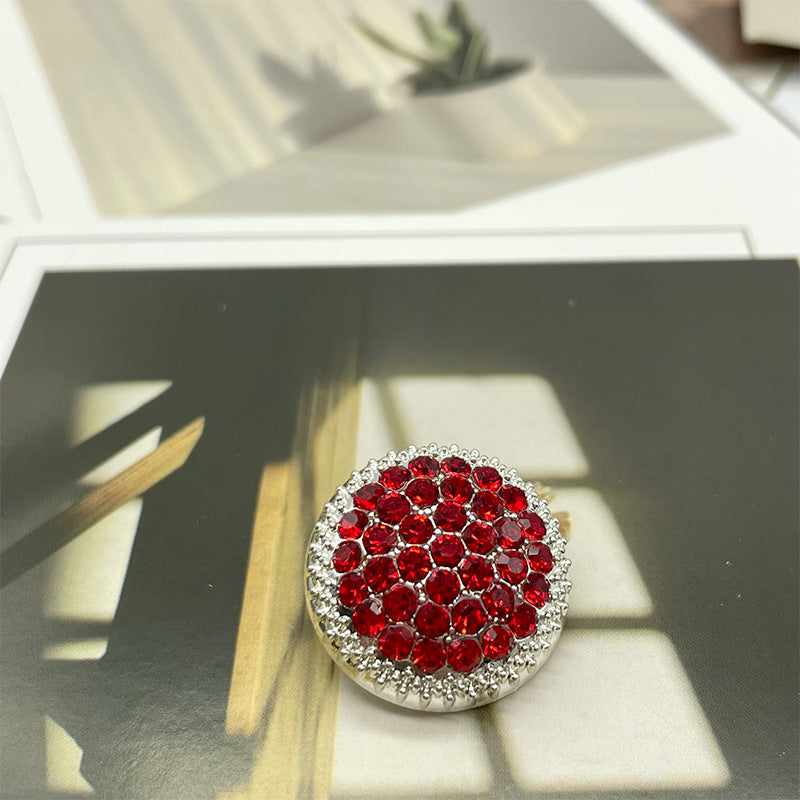 Round red crystal rhinestone button with silver outer bezel