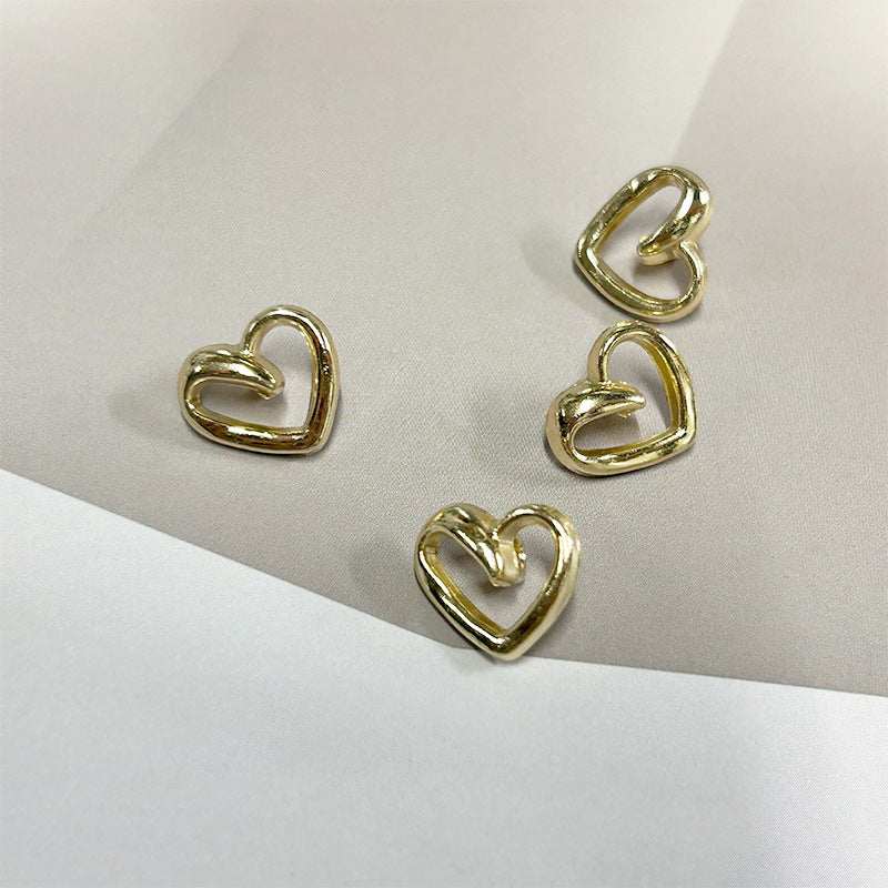 Set of gold heart shirt buttons with high-shank metal loops