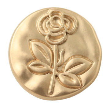 Round embossed floral metal button, gold-rose finish, decorative relief front.