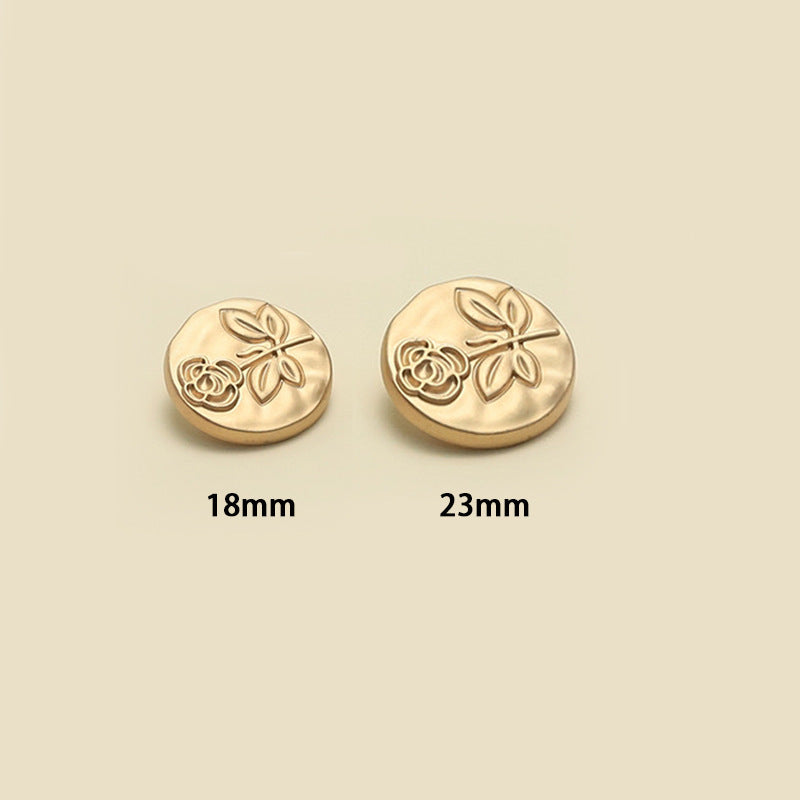 Pair of round gold-rose embossed floral buttons, 18mm and 23mm sizes shown.