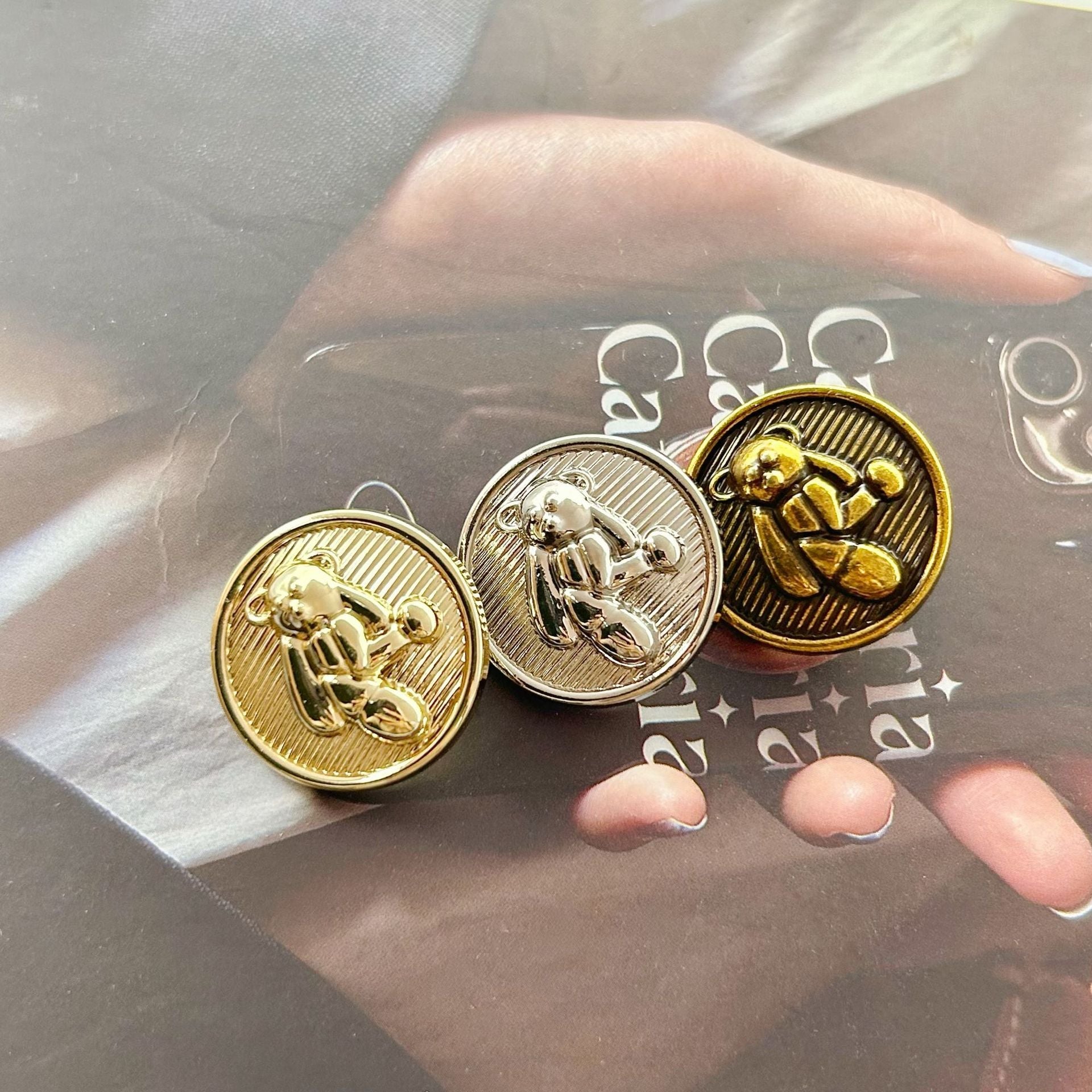 Decorative teddy bear buttons set: antique gold, gold, and silver rounds with shanks