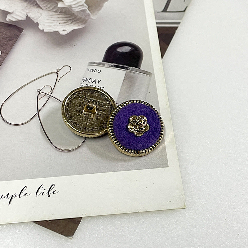 Flocked camellia metal buttons: olive-gold fabric and purple fabric with gold rose center