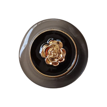 Black resin camellia button with gold-tone metal center, 18/23mm, coat & knitwear