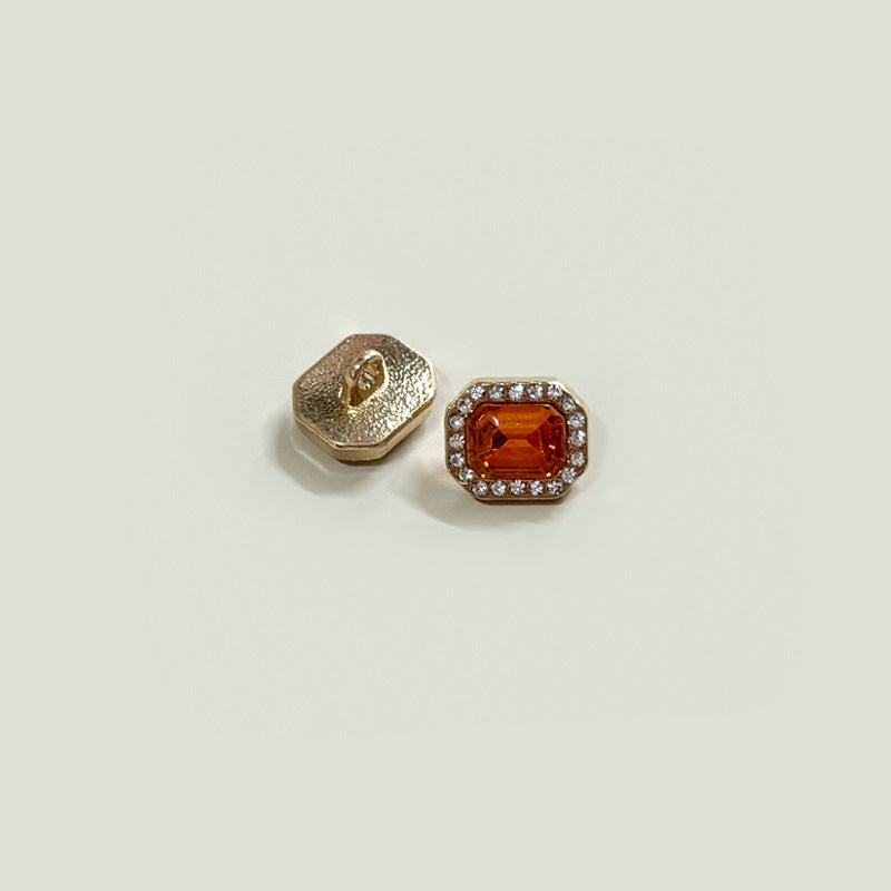 Square 12mm button with orange gemstone center and crystal border on gold-tone base