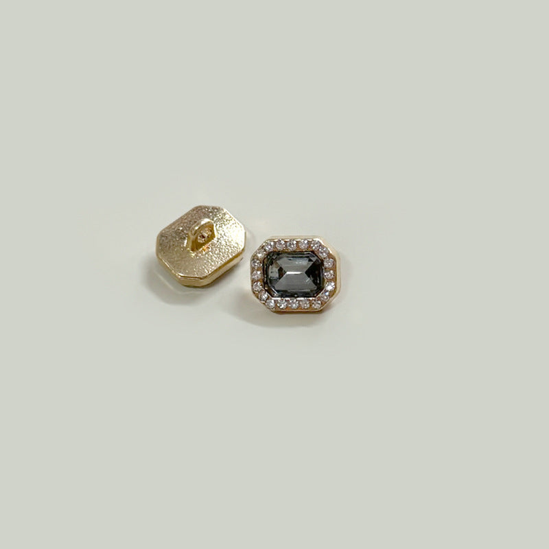 Square 12mm button with dark gray gemstone center and crystal border on gold-tone base